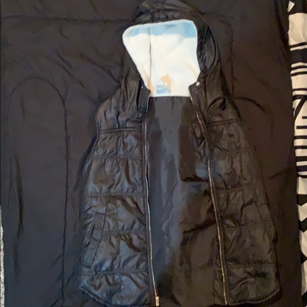 Black hooded vest